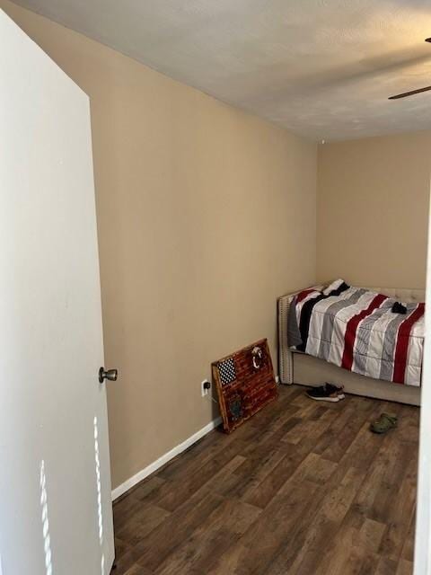 909 Harwell St, Abilene, TX 79601 - bedroom featuring a ceiling fan, baseboards, and wood finished floors