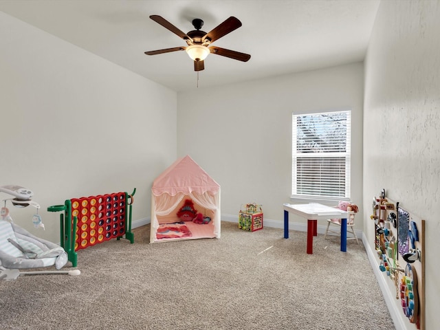 game room featuring baseboards, carpet floors, and ceiling fan