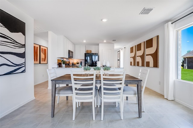 dining area with recessed lighting, visible vents, baseboards, and light tile patterned floors