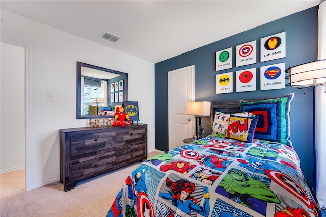 carpeted bedroom with baseboards and visible vents