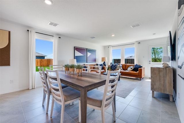 dining area featuring recessed lighting, visible vents, baseboards, and light tile patterned floors