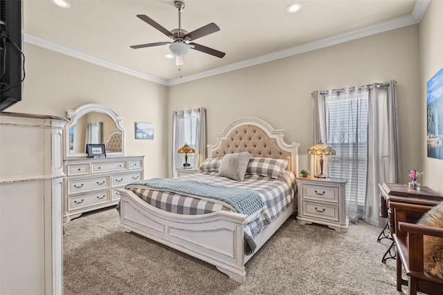 bedroom featuring light carpet, ornamental molding, and multiple windows