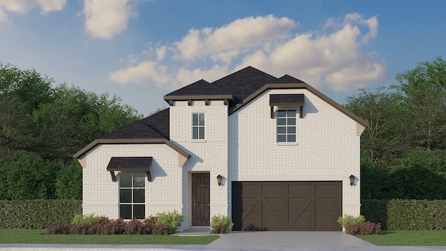 view of front facade with a garage, brick siding, and driveway