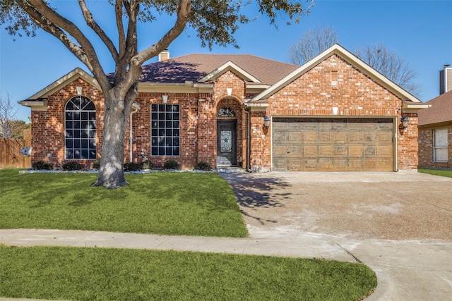 ranch-style house with an attached garage, a chimney, a front lawn, and brick siding