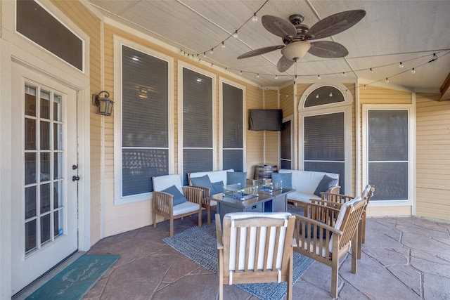 view of patio / terrace with ceiling fan and outdoor lounge area