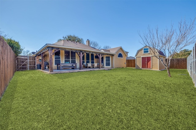 back of house with an outbuilding, a fenced backyard, a patio, and a shed