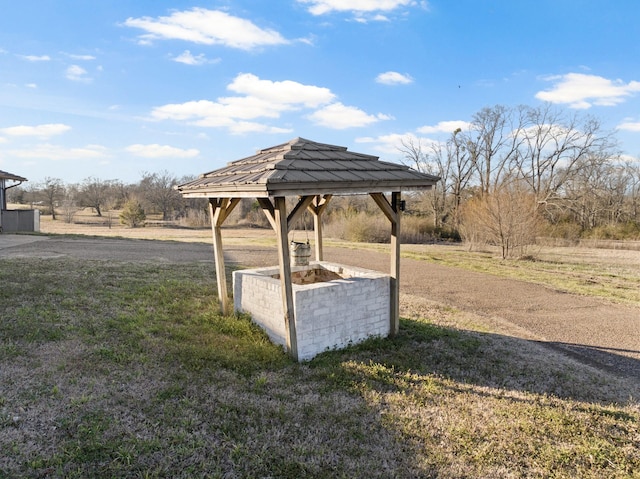 view of community featuring a yard and a gazebo