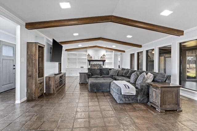 living room with vaulted ceiling with beams, stone tile floors, baseboards, built in features, and crown molding