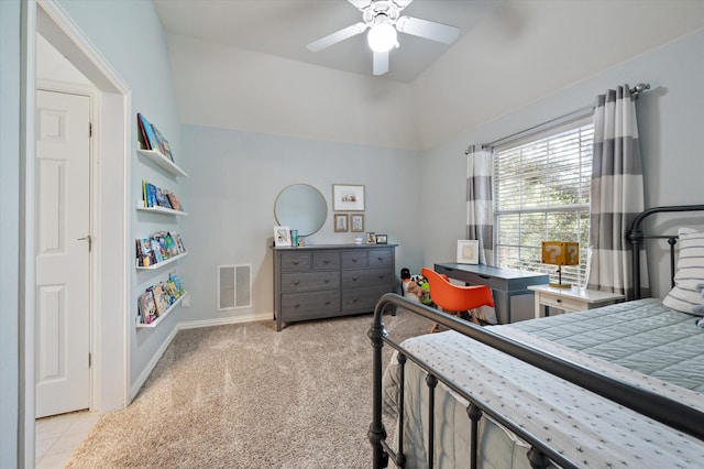 bedroom featuring baseboards, visible vents, a ceiling fan, and light colored carpet