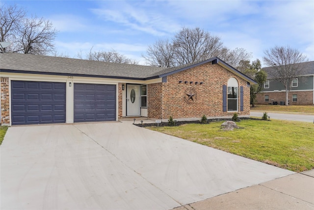 ranch-style house with an attached garage, brick siding, a shingled roof, concrete driveway, and a front lawn