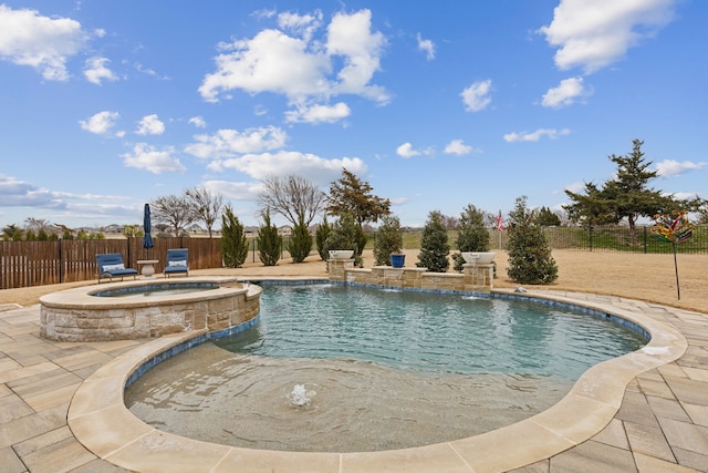 view of pool with a patio, a fenced backyard, and a pool with connected hot tub