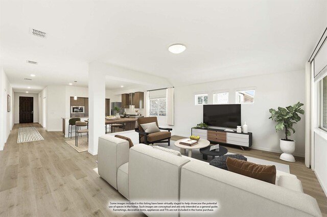 114 Winterwood Dr, Lavon, TX 75166 - living area featuring light wood finished floors, baseboards, and recessed lighting