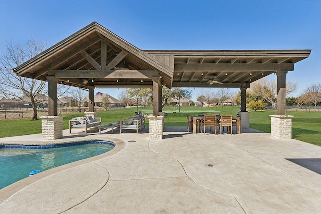 view of swimming pool featuring a fenced in pool, a yard, a patio, a gazebo, and fence