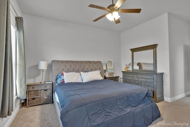 bedroom featuring ceiling fan, baseboards, and carpet flooring