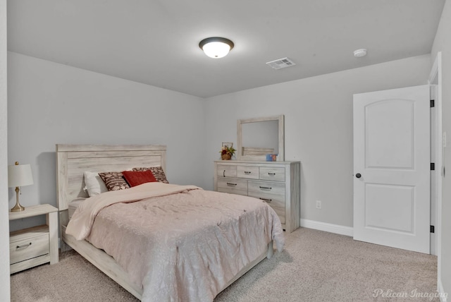 bedroom featuring light carpet, visible vents, and baseboards