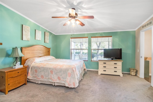 bedroom featuring baseboards, visible vents, a ceiling fan, ornamental molding, and carpet flooring