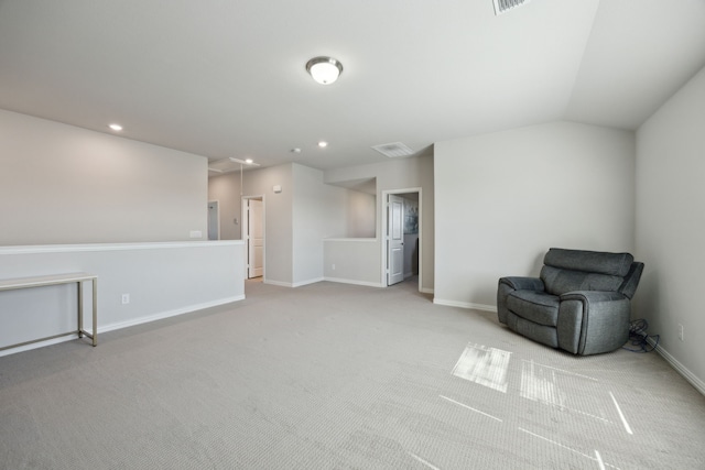 unfurnished room featuring light carpet, attic access, visible vents, baseboards, and recessed lighting