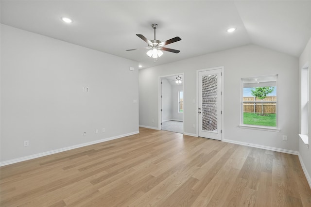 unfurnished living room featuring a ceiling fan, lofted ceiling, recessed lighting, baseboards, and light wood-style floors
