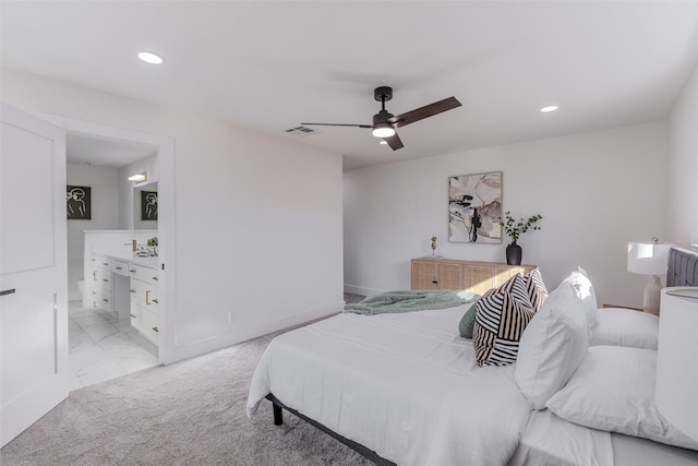 bedroom with recessed lighting, visible vents, light colored carpet, ensuite bathroom, and a ceiling fan