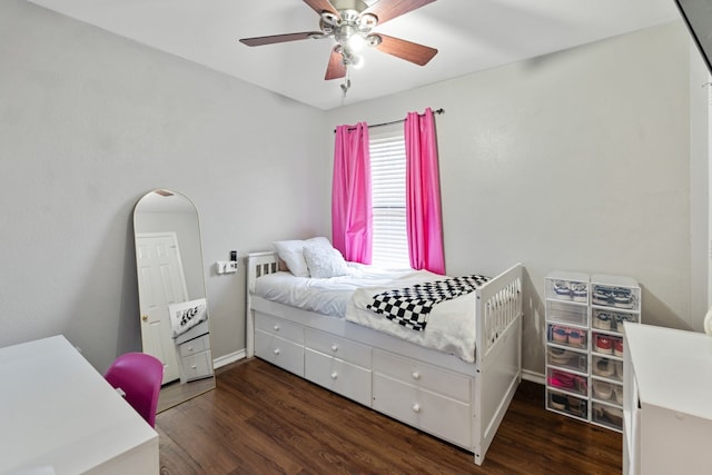 bedroom with dark wood finished floors and ceiling fan