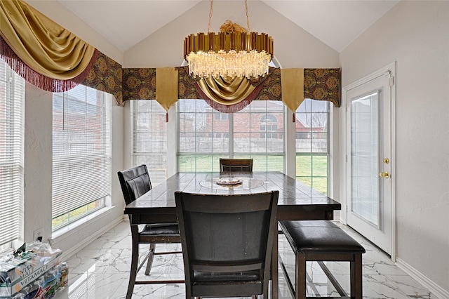 sunroom / solarium with a chandelier and lofted ceiling