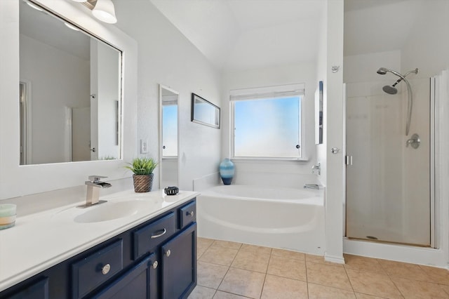 full bath with tile patterned floors, a garden tub, vanity, and a shower stall