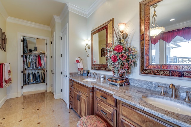 bathroom with double vanity, ornamental molding, and a sink