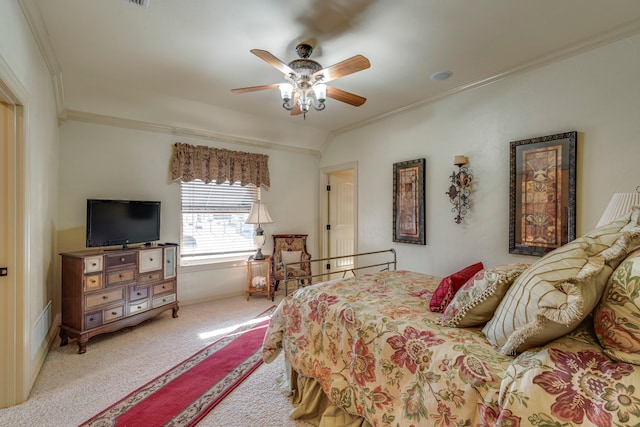 bedroom featuring visible vents, ornamental molding, a ceiling fan, and light colored carpet