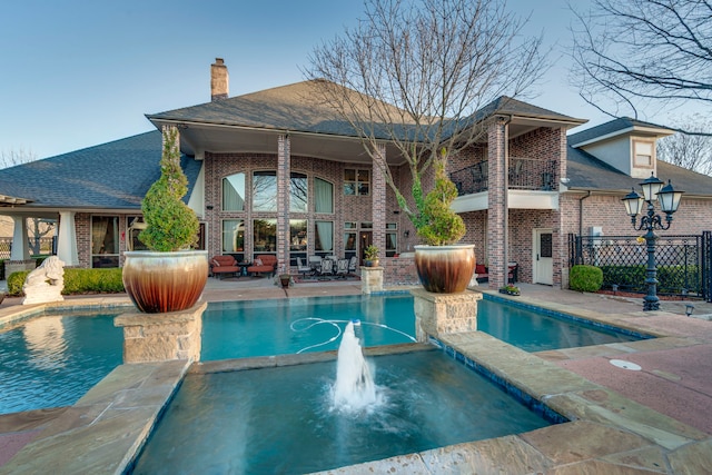 view of pool with a patio, fence, and a fenced in pool