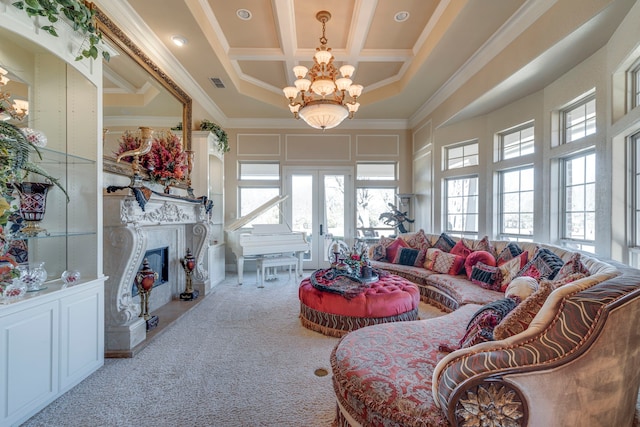 living room featuring french doors, a towering ceiling, a high end fireplace, a chandelier, and coffered ceiling