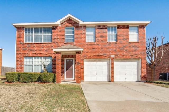 colonial house featuring driveway, a garage, brick siding, central AC unit, and a front yard