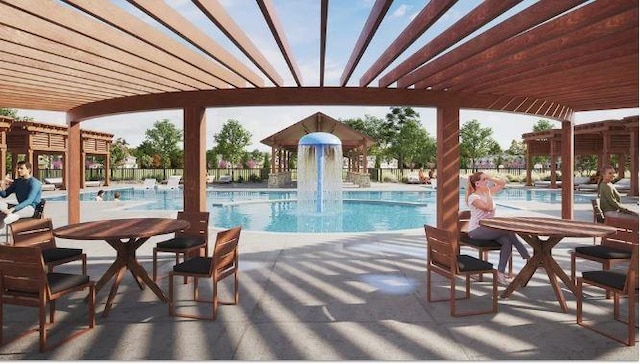 community pool featuring a patio area and fence