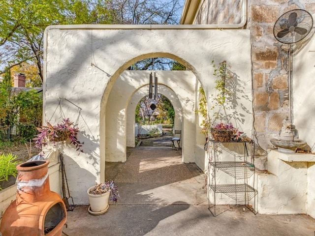 view of community with a patio