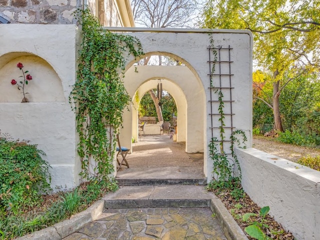 view of home's community with a patio