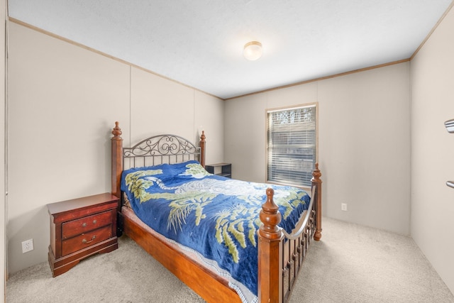 carpeted bedroom with crown molding