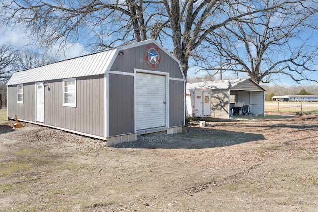 view of outdoor structure featuring an outdoor structure and fence