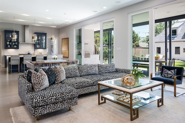 living room featuring wood finished floors and recessed lighting