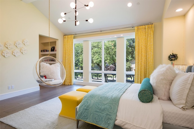 bedroom featuring lofted ceiling, recessed lighting, wood finished floors, a chandelier, and baseboards