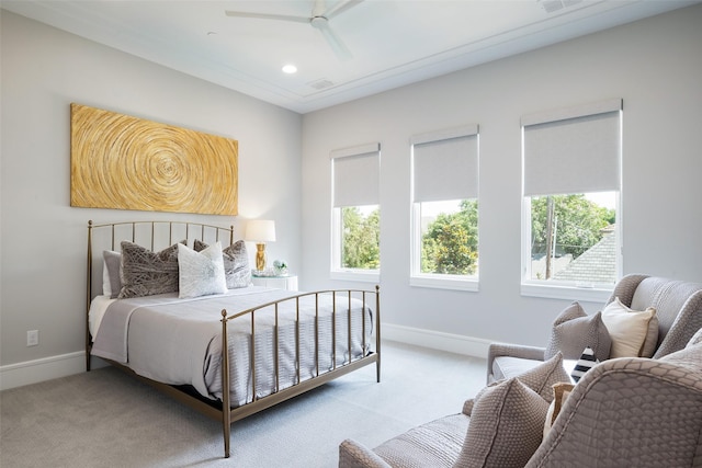 carpeted bedroom with a ceiling fan, recessed lighting, visible vents, and baseboards