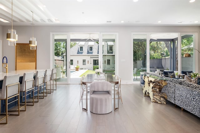 living room featuring visible vents, a ceiling fan, wood finished floors, and recessed lighting