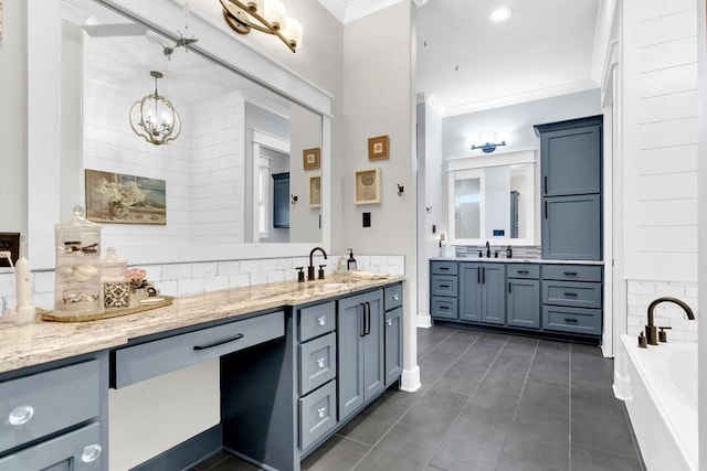 bathroom featuring tile patterned floors, a bathtub, crown molding, vanity, and backsplash