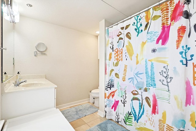 bathroom with baseboards, toilet, a shower with shower curtain, tile patterned floors, and vanity