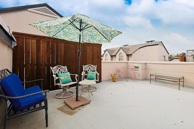 view of patio with fence