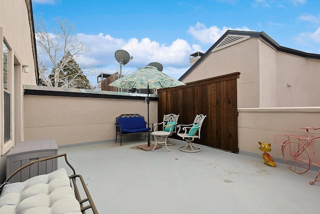 view of patio / terrace with fence