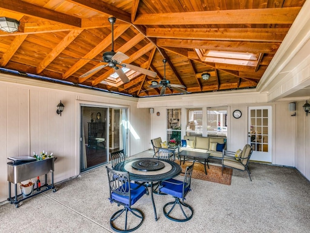 view of patio / terrace with an outdoor living space and a ceiling fan