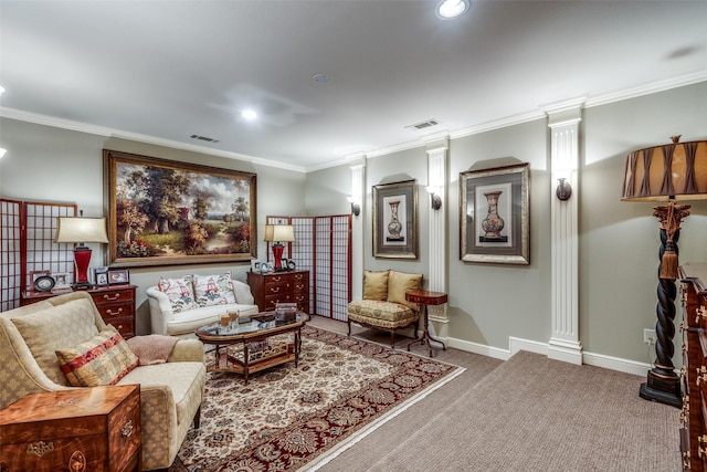 carpeted living area with ornamental molding, visible vents, decorative columns, and baseboards