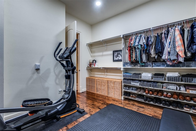 exercise area featuring wood finished floors