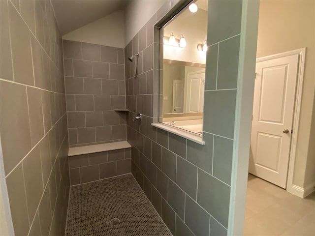 bathroom featuring tiled shower