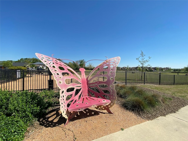 view of playground featuring fence