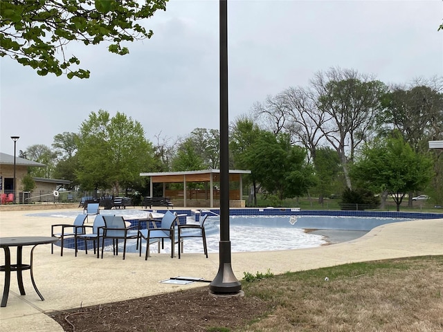 pool featuring fence